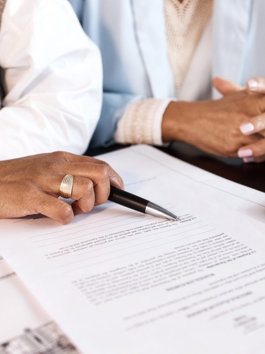 contract-paper-and-people-hands-with-document-for-legal-advice-law-firm-strategy-and-negotiation.jpg